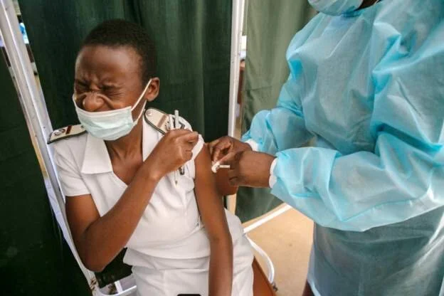 Zimbabwe asks state employees to take a jab or quit