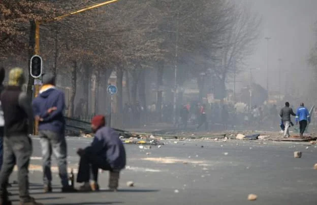 Calls for calm after South Africa protest deaths