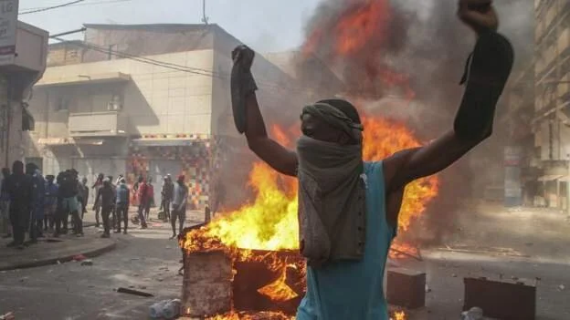 Senegal holds day of mourning after violent protests 