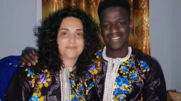 Gambian migrant takes his Sicilian mother back home 