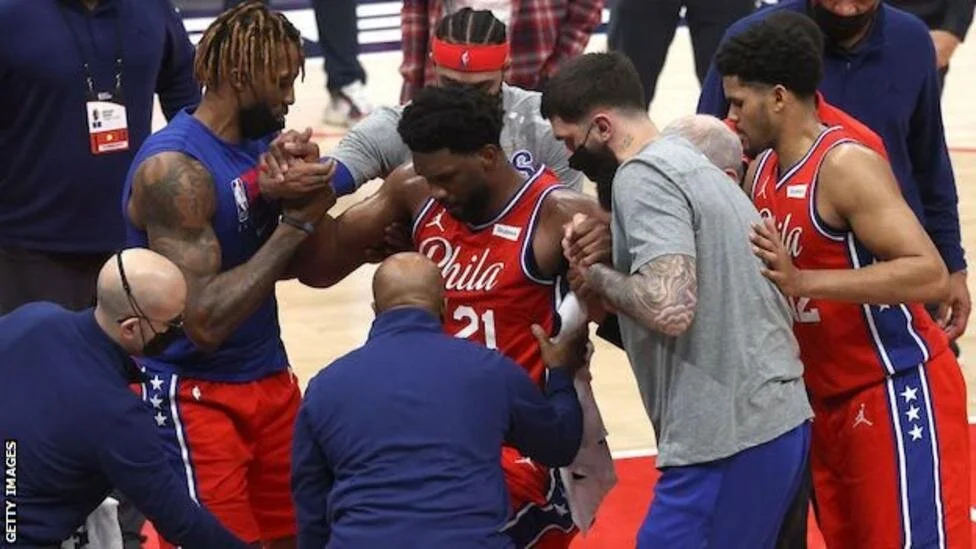 NBA: Joel Embiid injured on return as Philadelphia 76ers beat Washington Wizards
