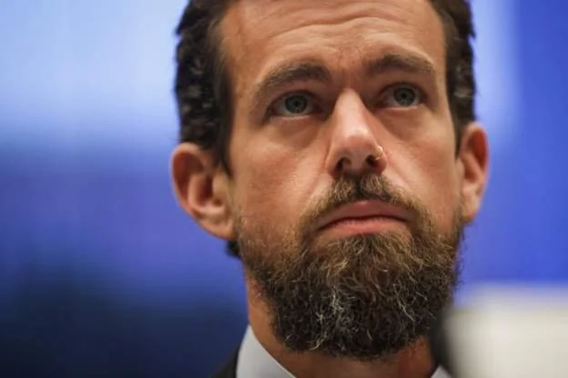 Twitter boss posts Nigerian flag as protests held