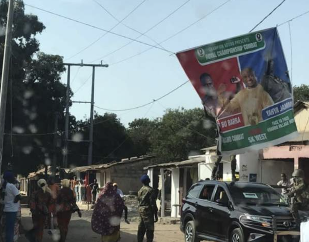 Gambian army 'sorry' after soldiers tear off opposition posters