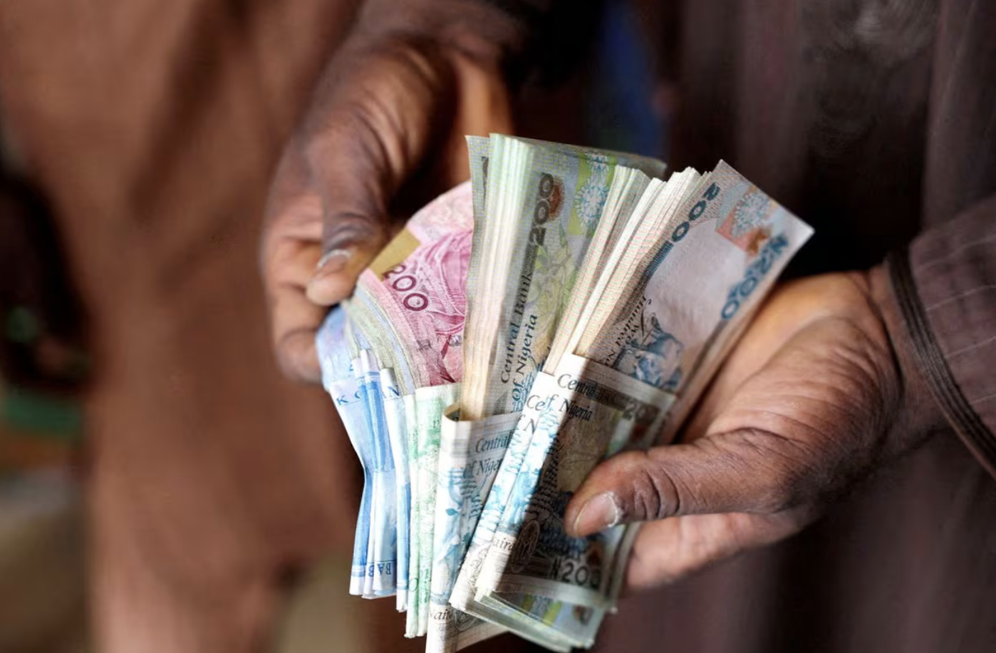 Nigeria naira hits record low near unofficial market rate