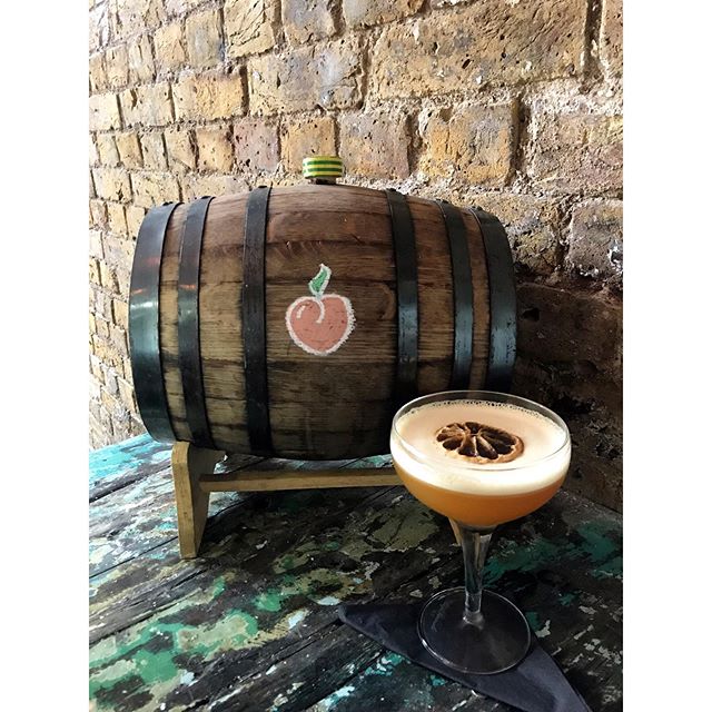 Feeling peachy? Our &lsquo;peaches in the barrel&rsquo; cocktail combines cask aged rum, peach liqueur and a dash of chocolate bitters 🍑