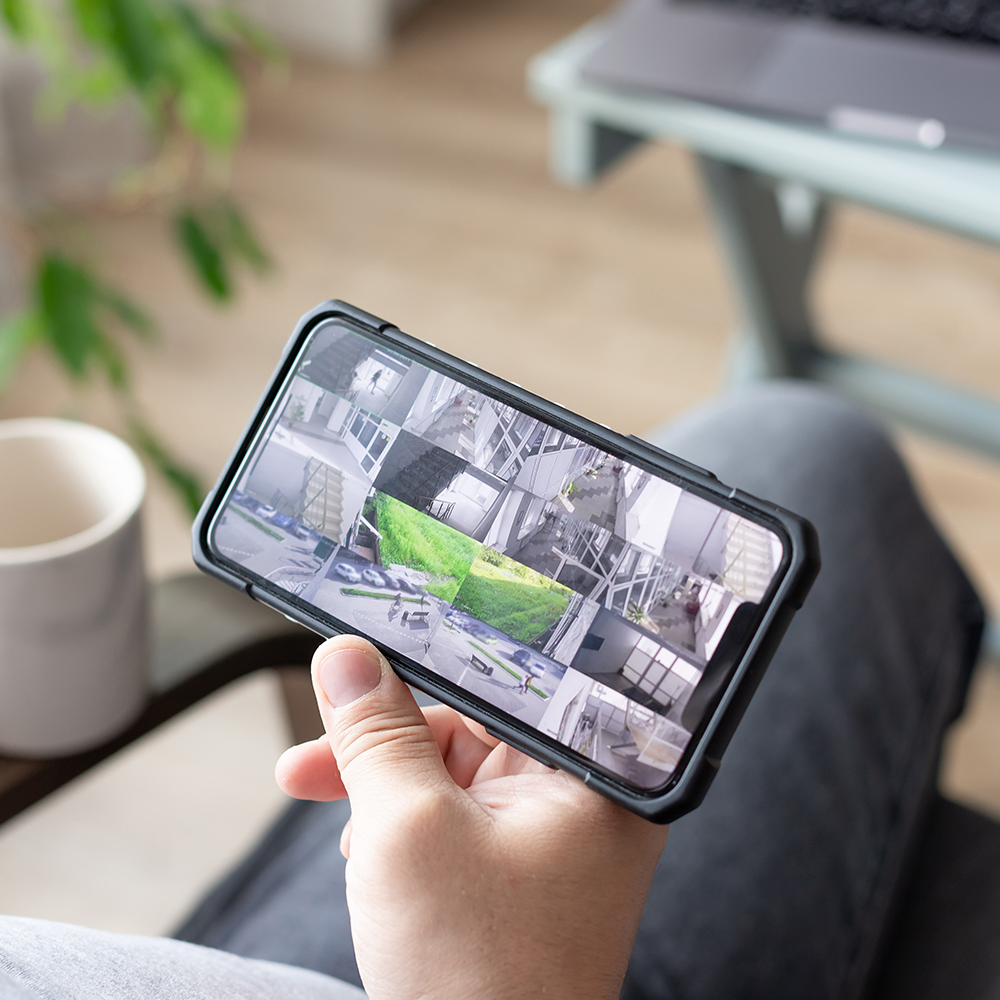 Home security cameras viewed on a smartphone.