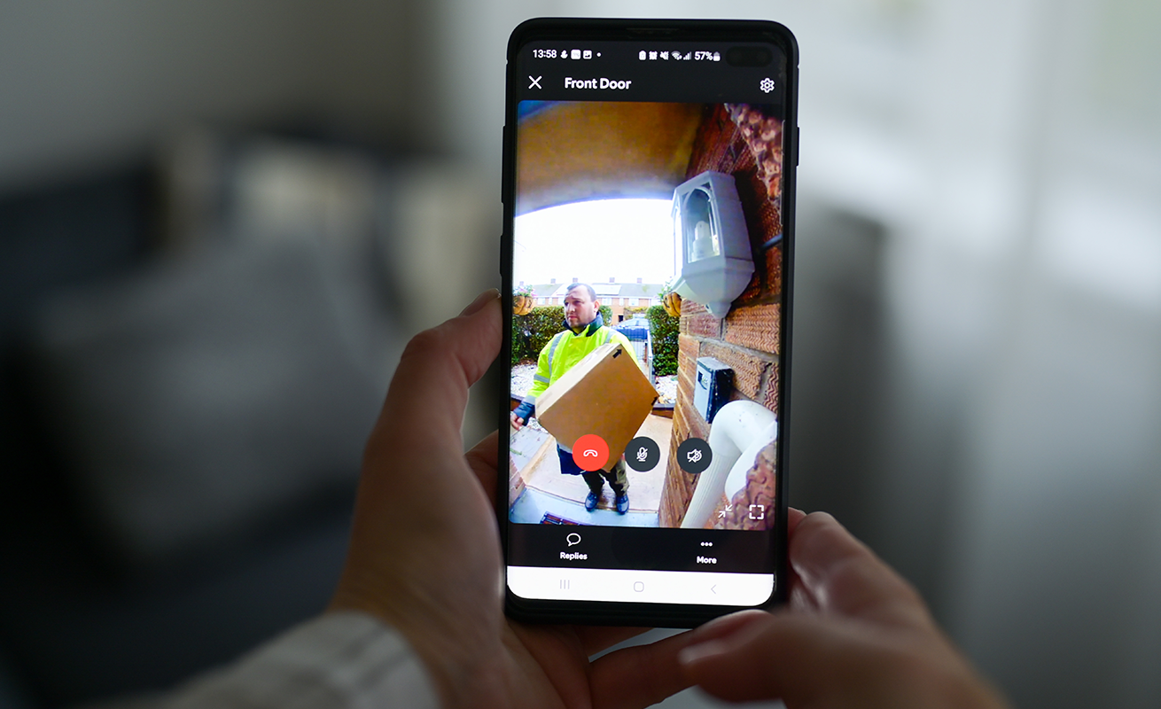 Live home security camera view on a smartphone.