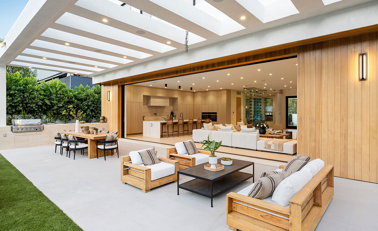 Modern luxury outdoor living area with covered patio.