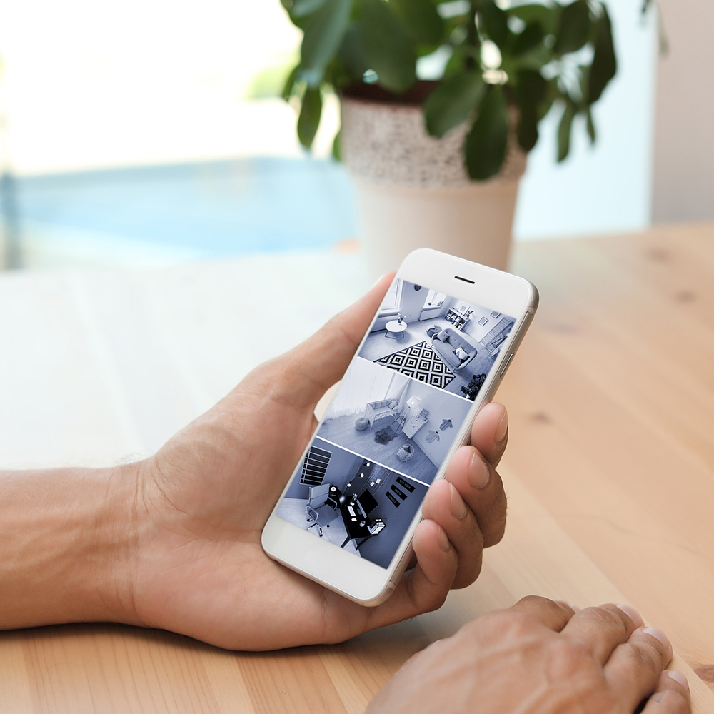 Home security cameras monitored from a smartphone.