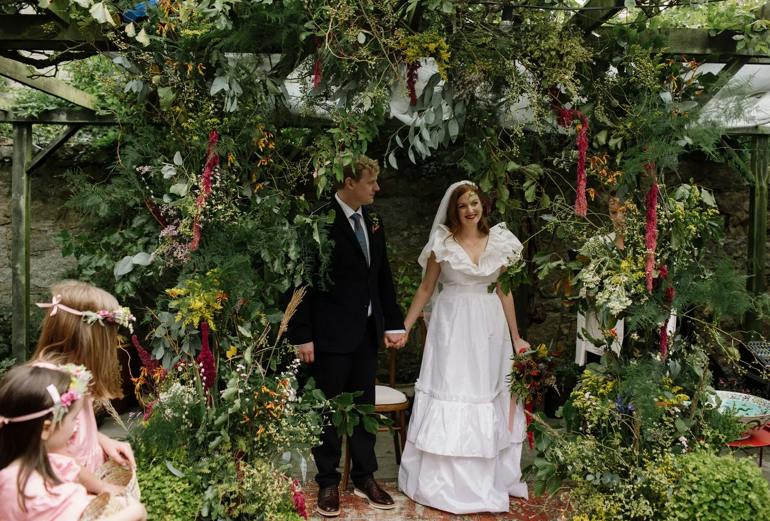 Wild+garden+ceremony+backdrop+Ireland.webp