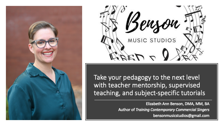 Professional photo of white woman with short hair in glasses and a green shirt, smiling.