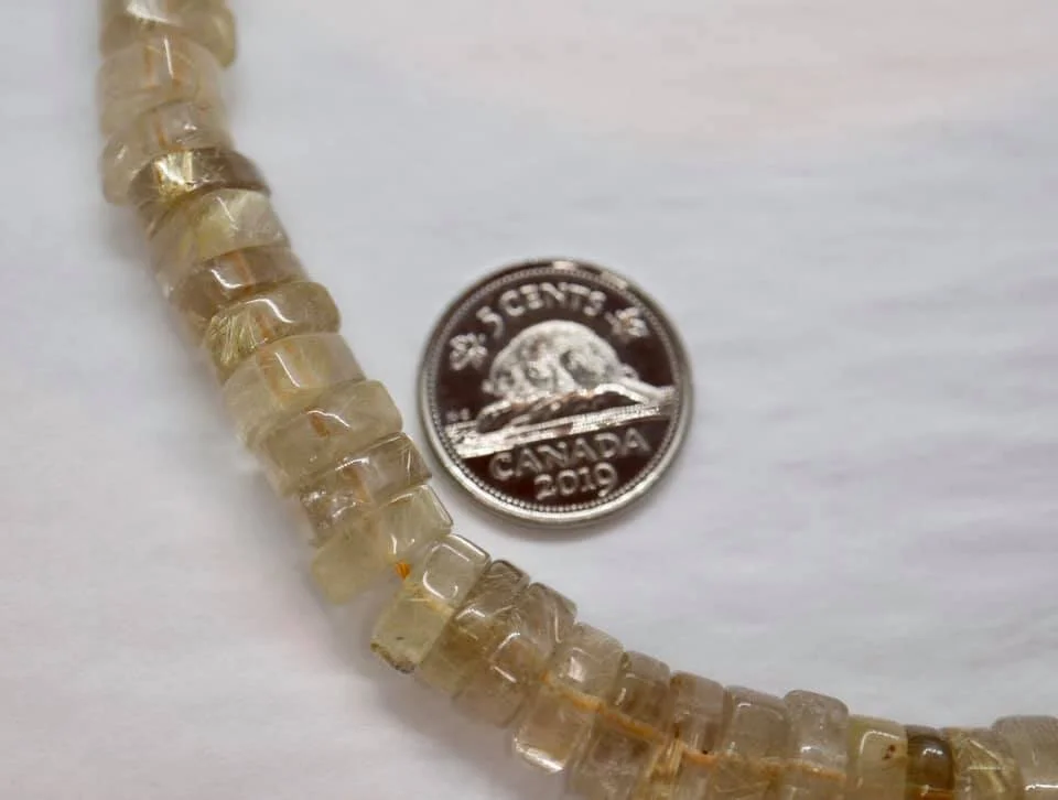 Hand-cut Rutilated Quartz Strand