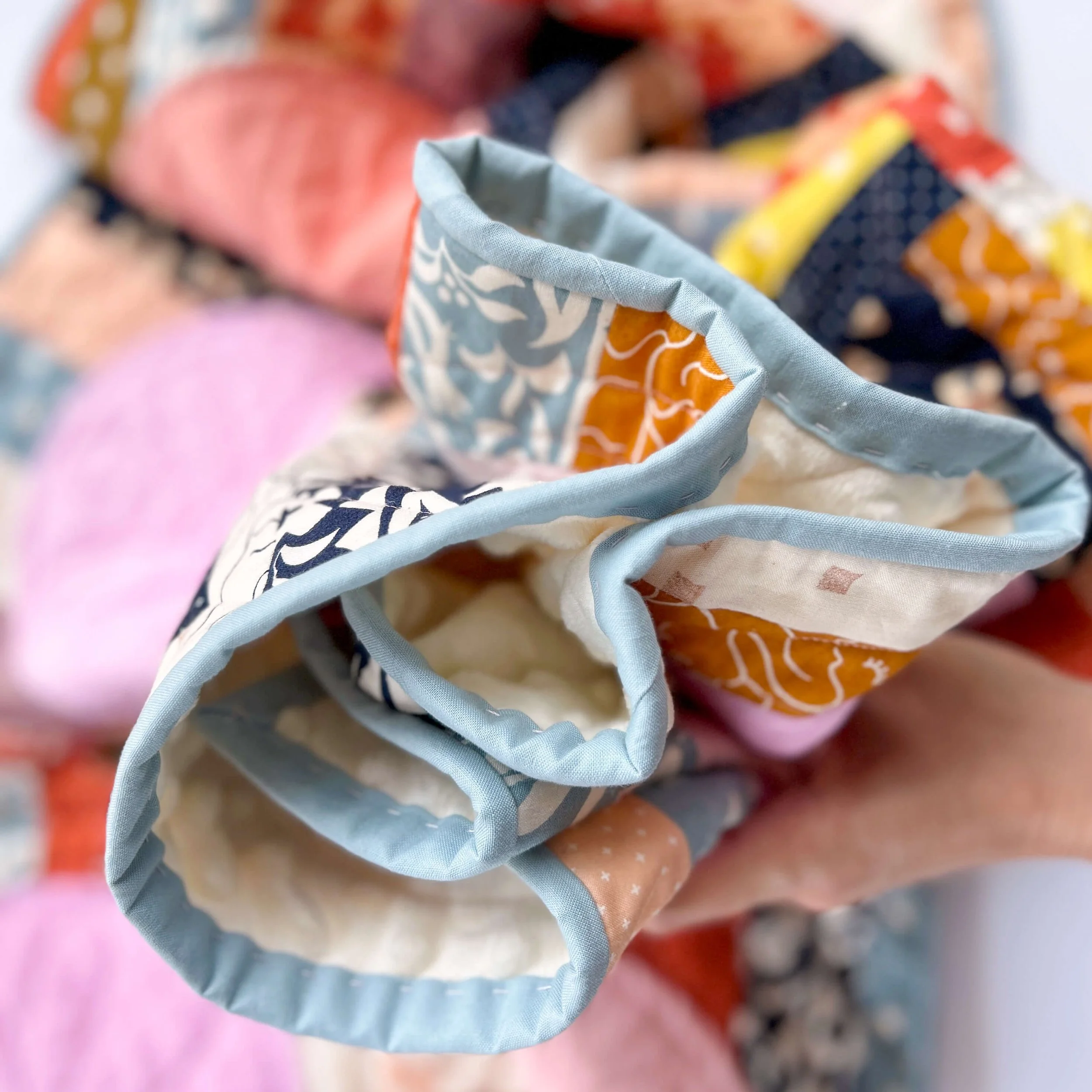 Binding a Quilt — Megan Collins