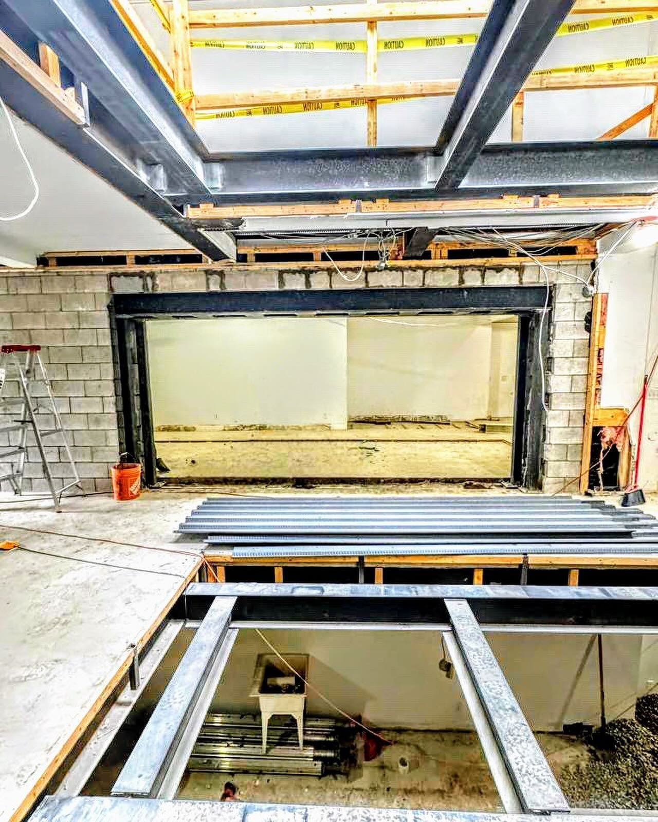Steel floor infills &amp; wall openings for commercial space. 

Walls cut by @cj.constructors along with the shoring which has been removed now exposing the steel structure.

@carbonbuild GC