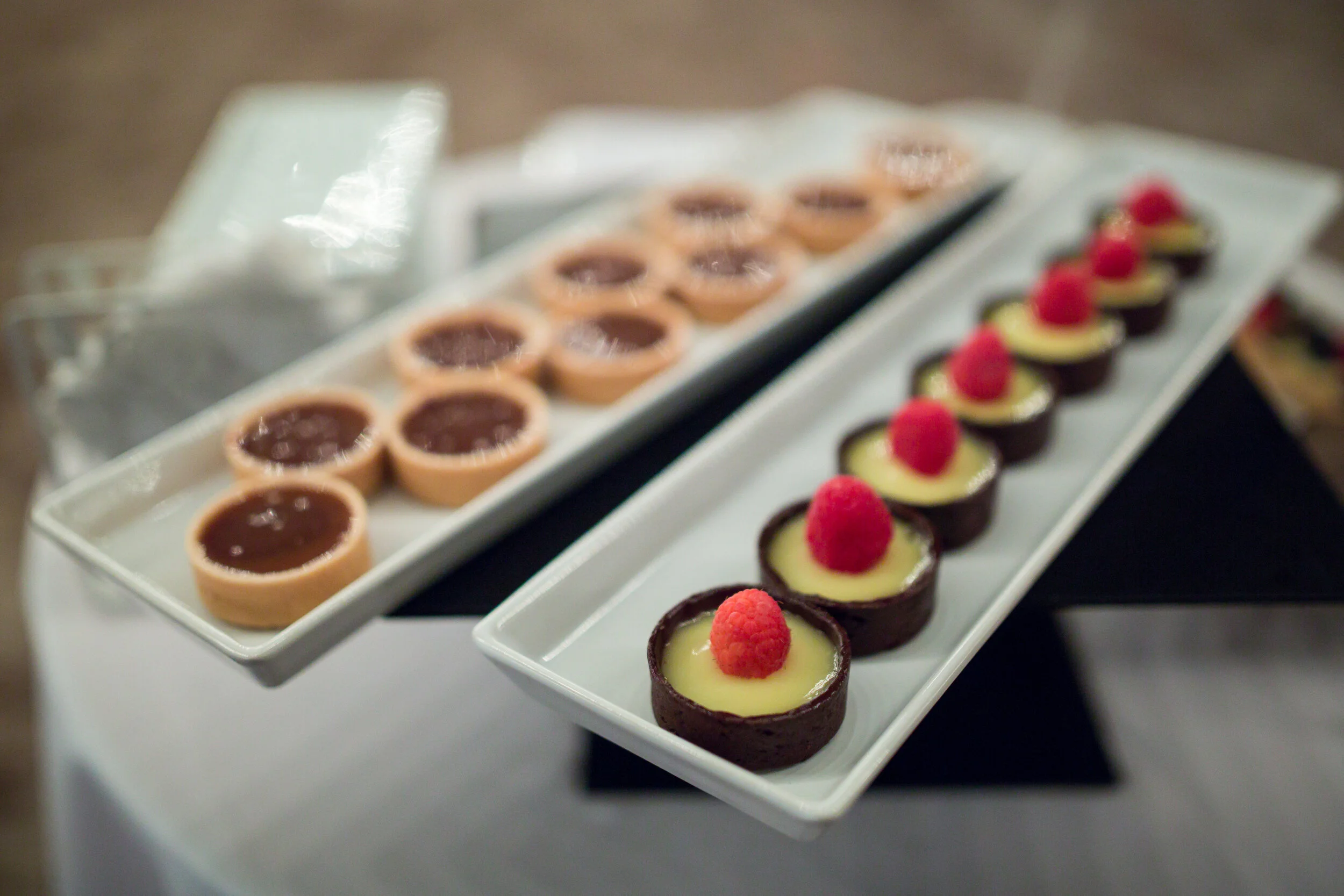 two trays with desserts