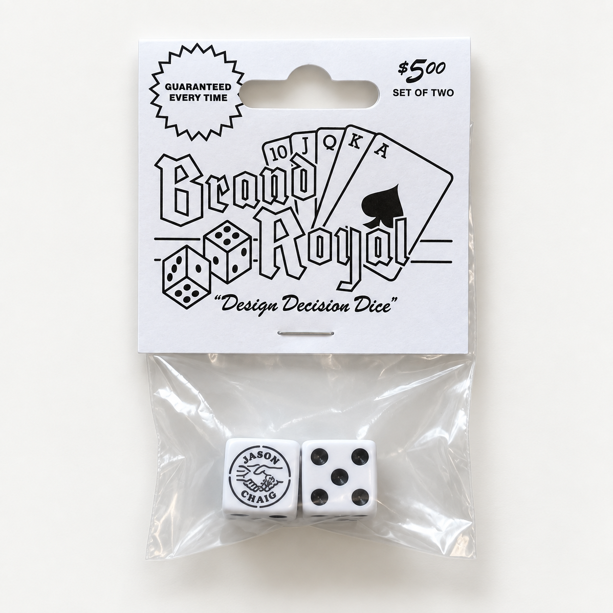 Brand Royal Designer Dice by Jason Craig, packaged set of two white dice with design decision header card