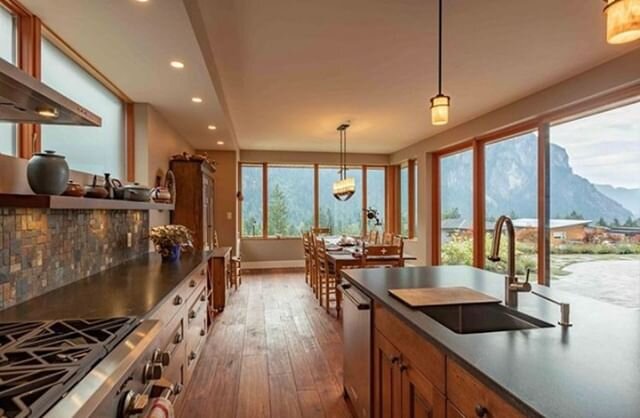 Expansive spaces for expansive views. 🌄🌲🏔⠀⠀
⠀⠀
⠀⠀
#homerenovations #customhome #renovations #designbuild #whistler #vacationhome #mountainliving #interiordesign #interiors #kitchen #kitchenrenovation #kitchenremodel #diningroom #whistlerrealestate