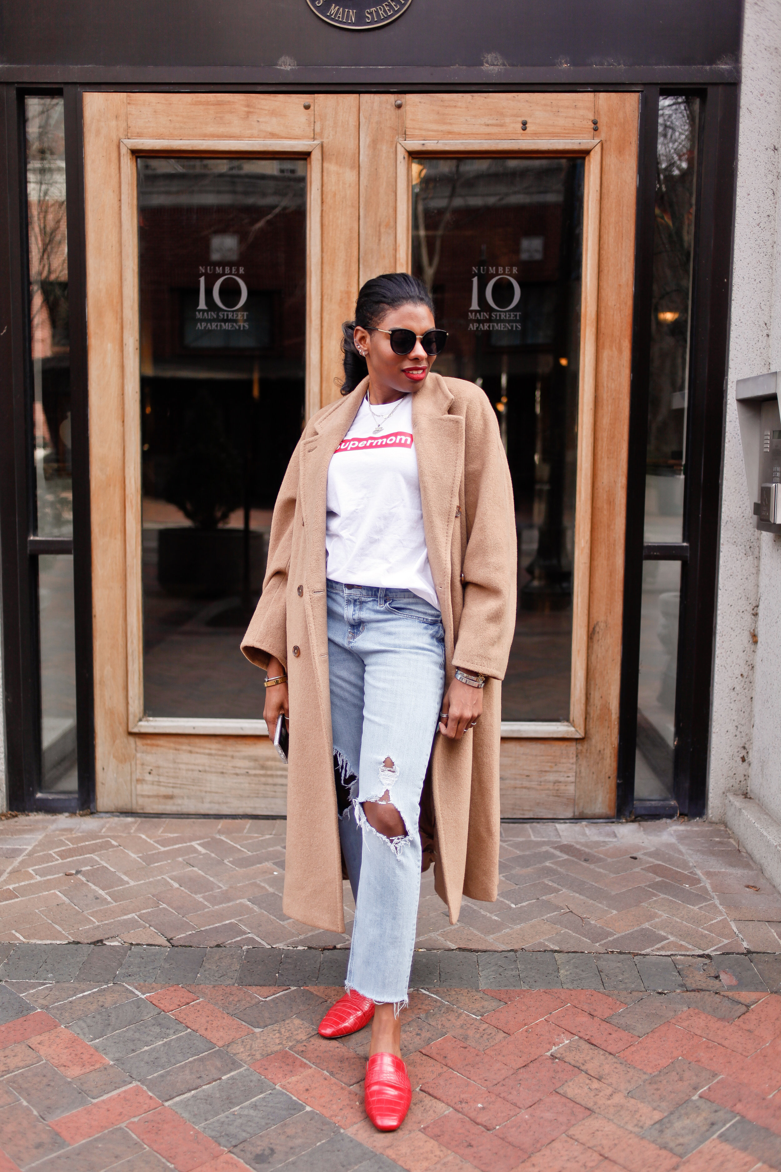 camel coat with jeans