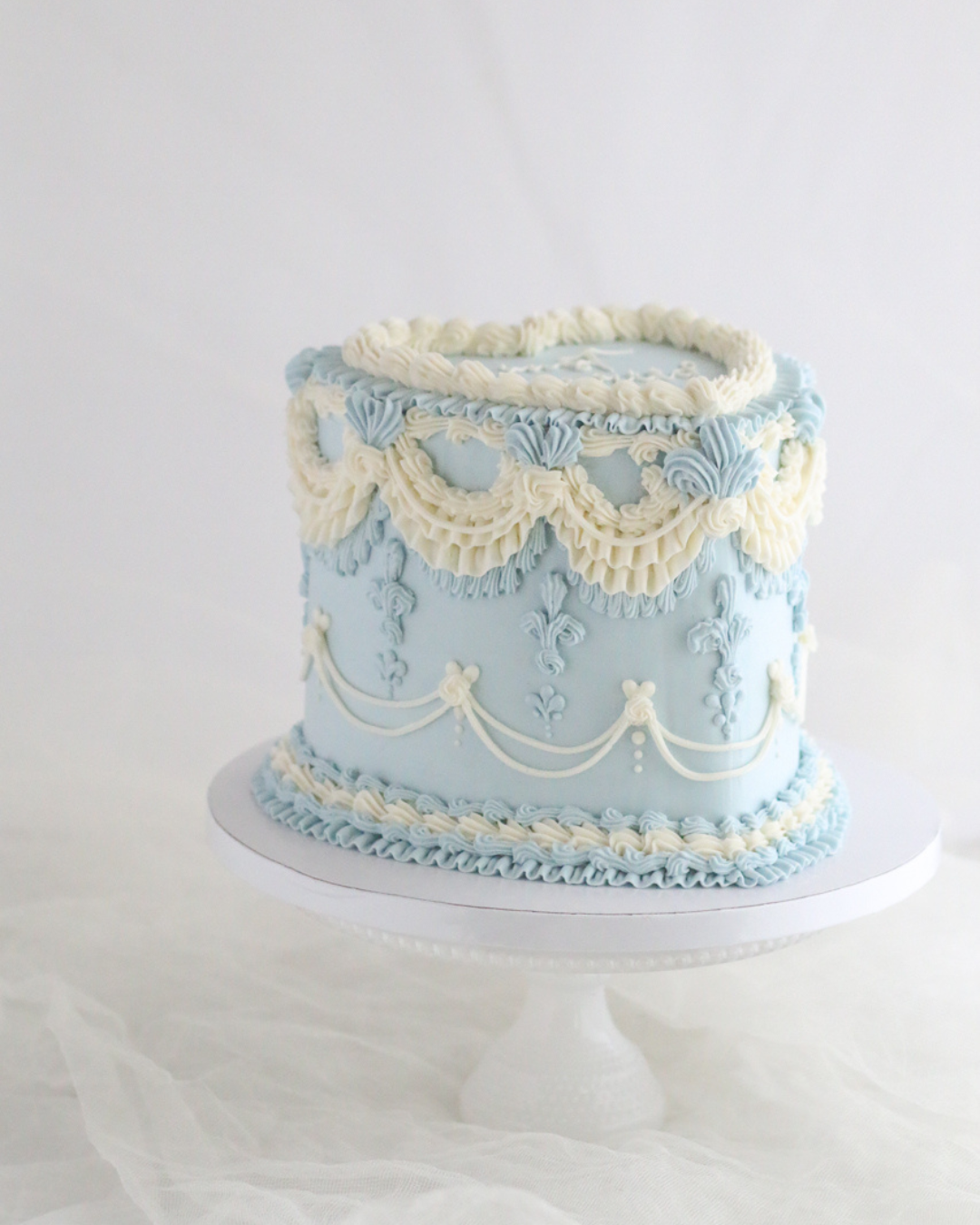 Something Blue: A Vintage Heart-Shaped Wedding Cake for an Intimate Celebration