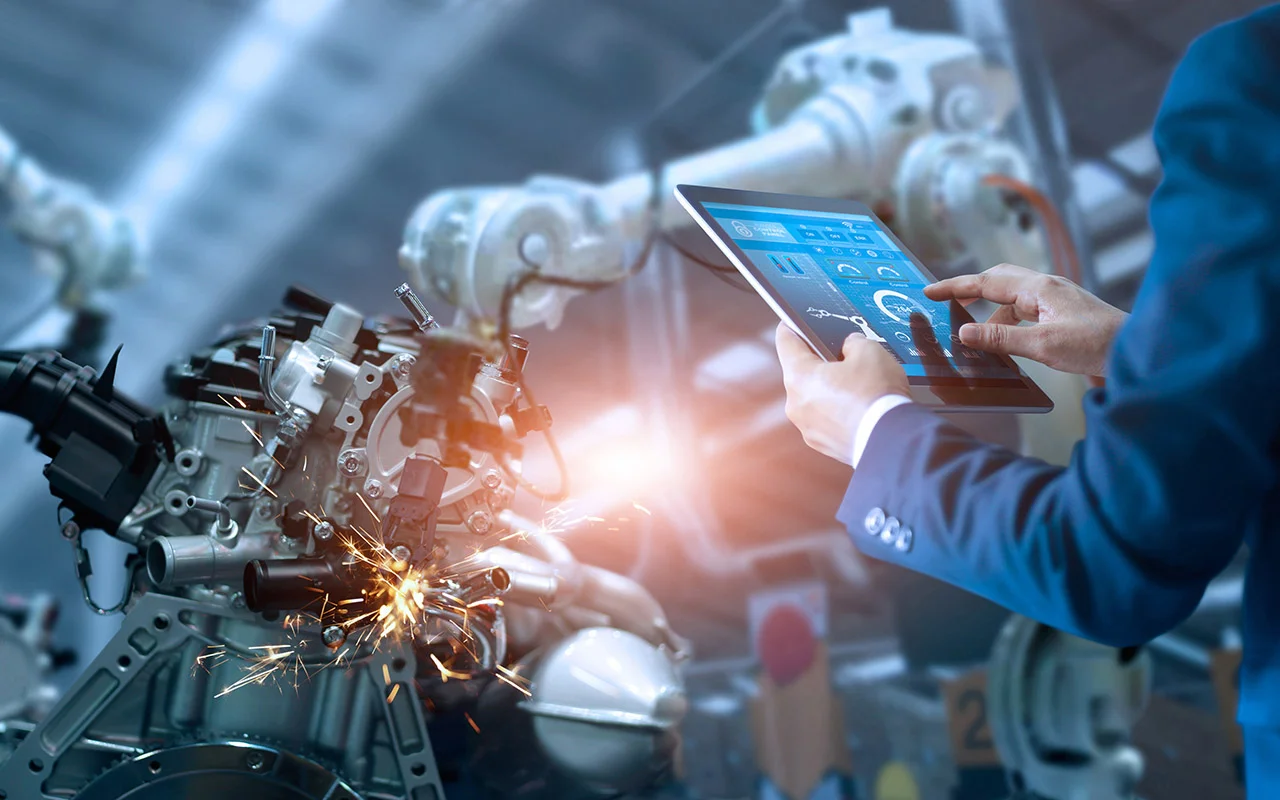 Montagearbeitsplatz mit integriertem Tablet für Arbeitsanweisungen und Augmented-Reality Steuerung von Maschinen