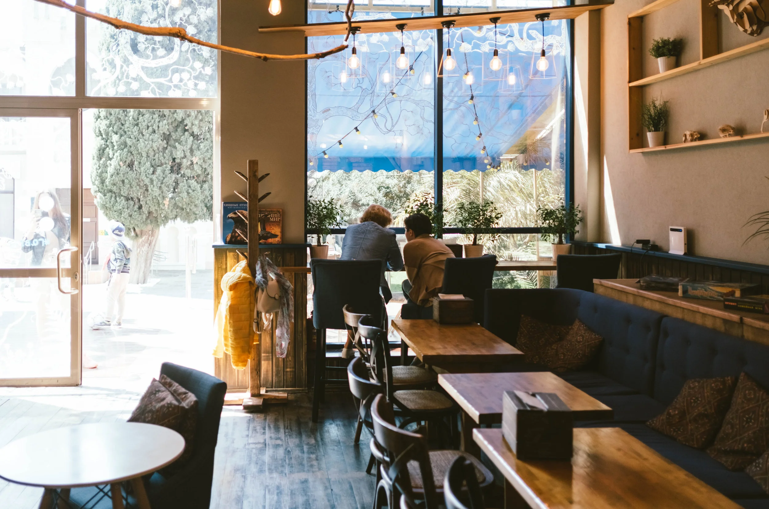 Canva - Two Persons in a Restaurant.jpg