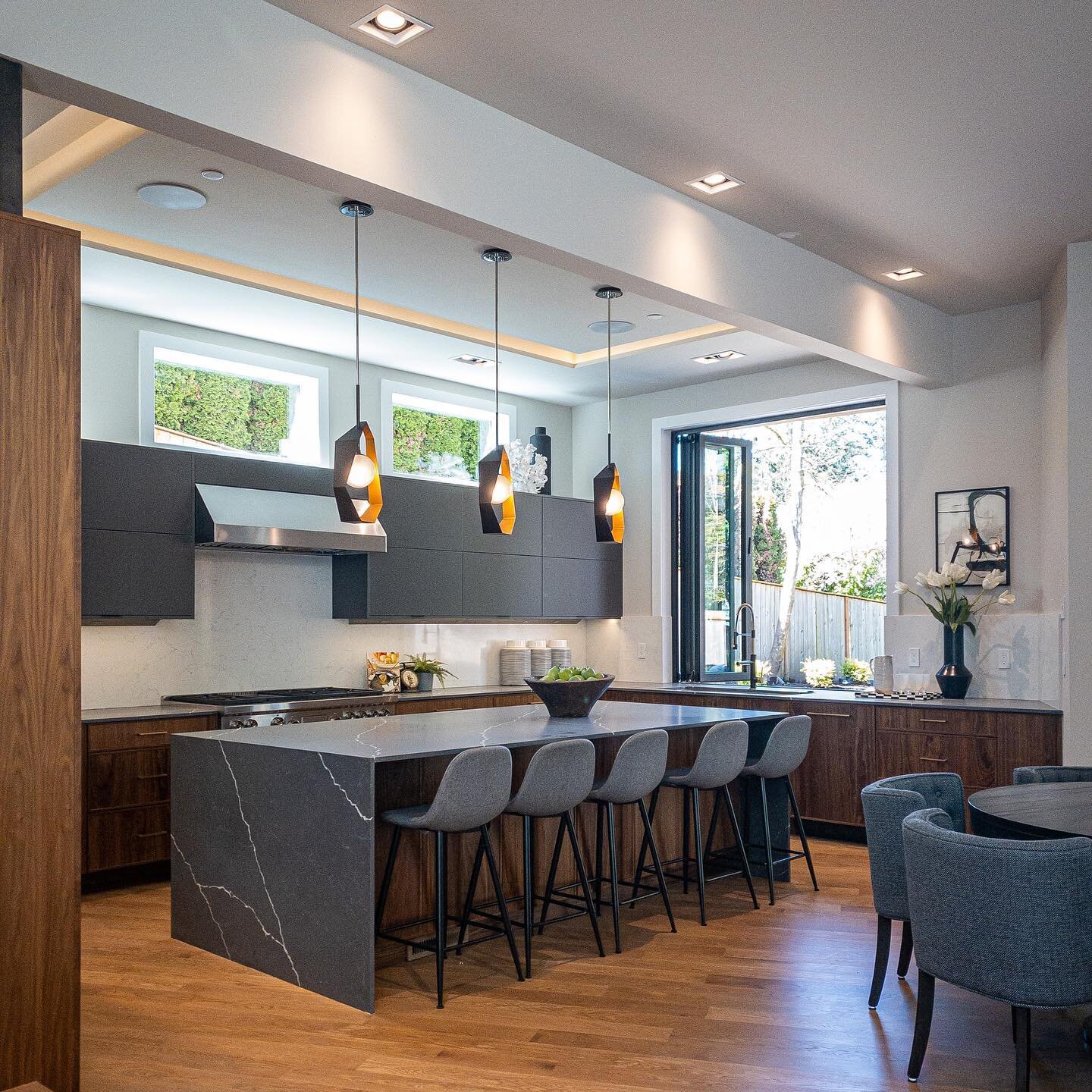 Yep! It&rsquo;s almost ready to be on the market! #oakandironhouse #medina #kitchen #walnutcabinets #oakhardwoodfloors #nanawindow #bellmontcabinets #wolfappliances #troylighting #quartzcountertops #m&eacute;trica