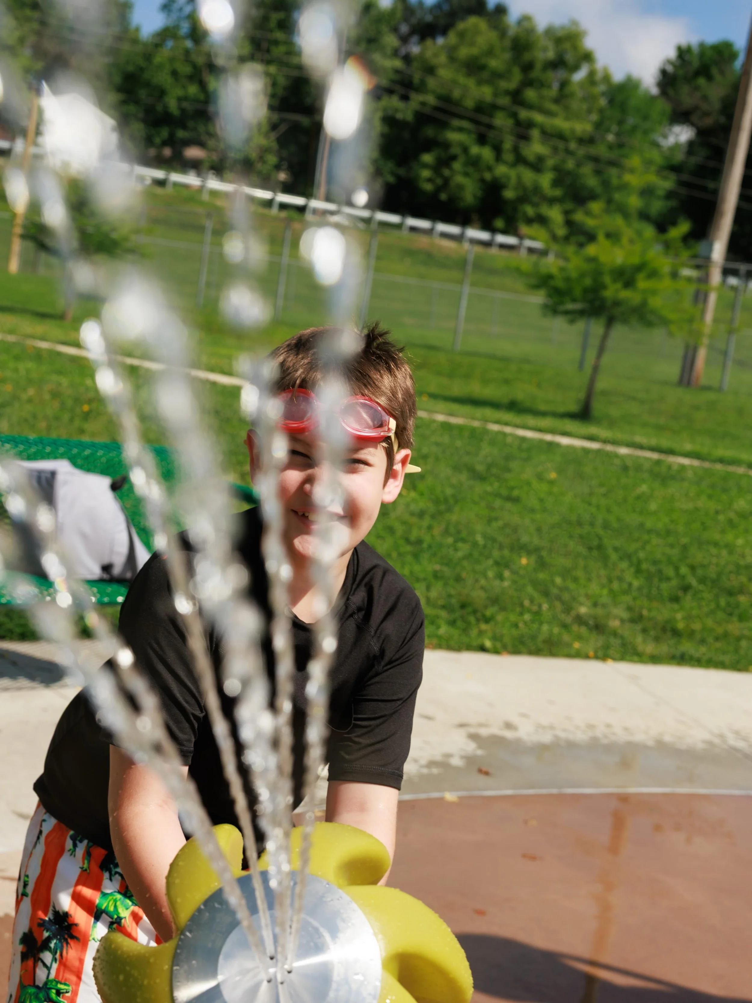 Not all sessions can be choreographed perfectly. 
Not all kids can sit and look at the camera. 

So we pivot, we discuss what you kids can do and what they like to do. So if that means a trip to the splash pad, then let's go! 

Don't forget, summer p