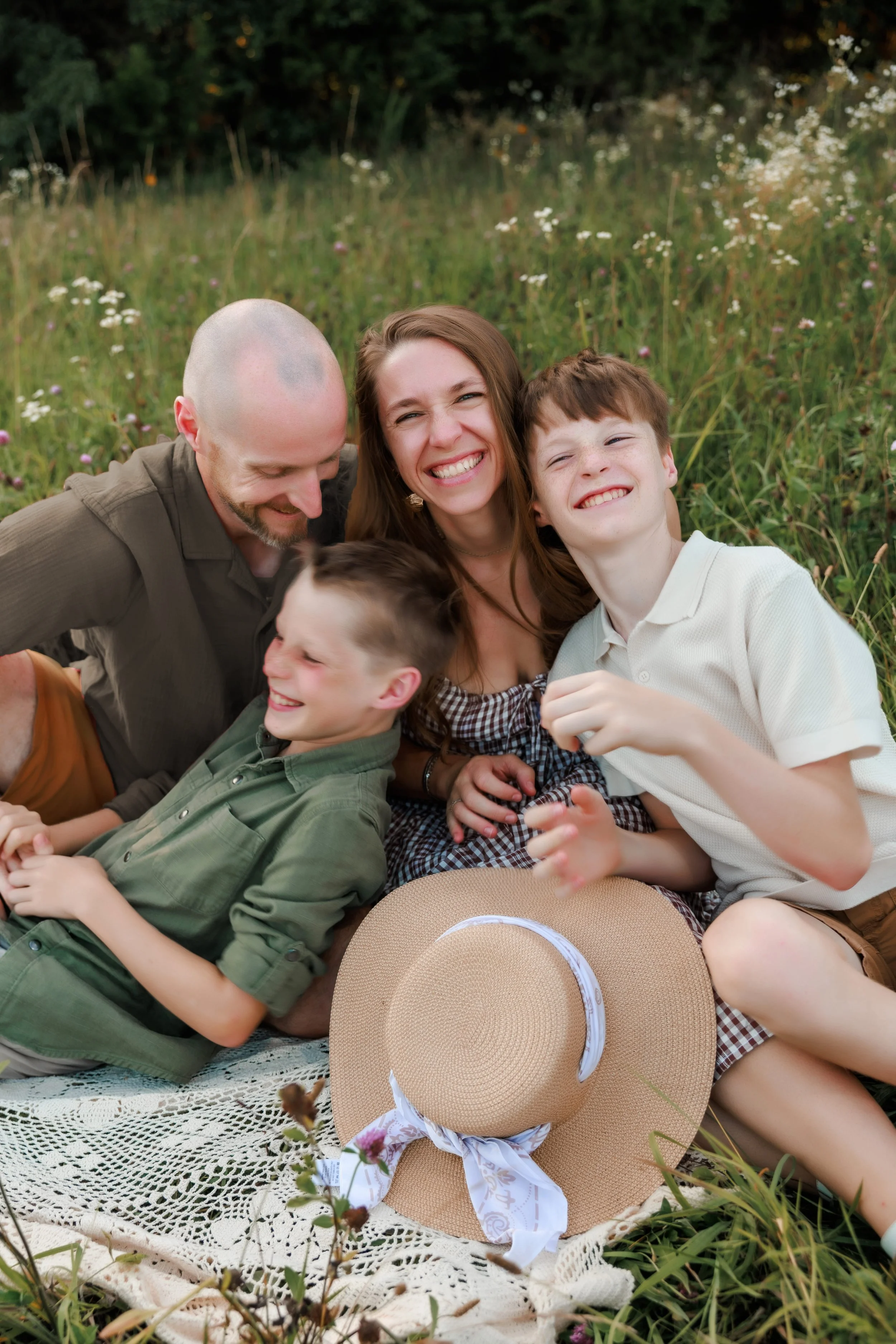   "Kansas City family photographer - family in neutral outfits at outdoor session"  
