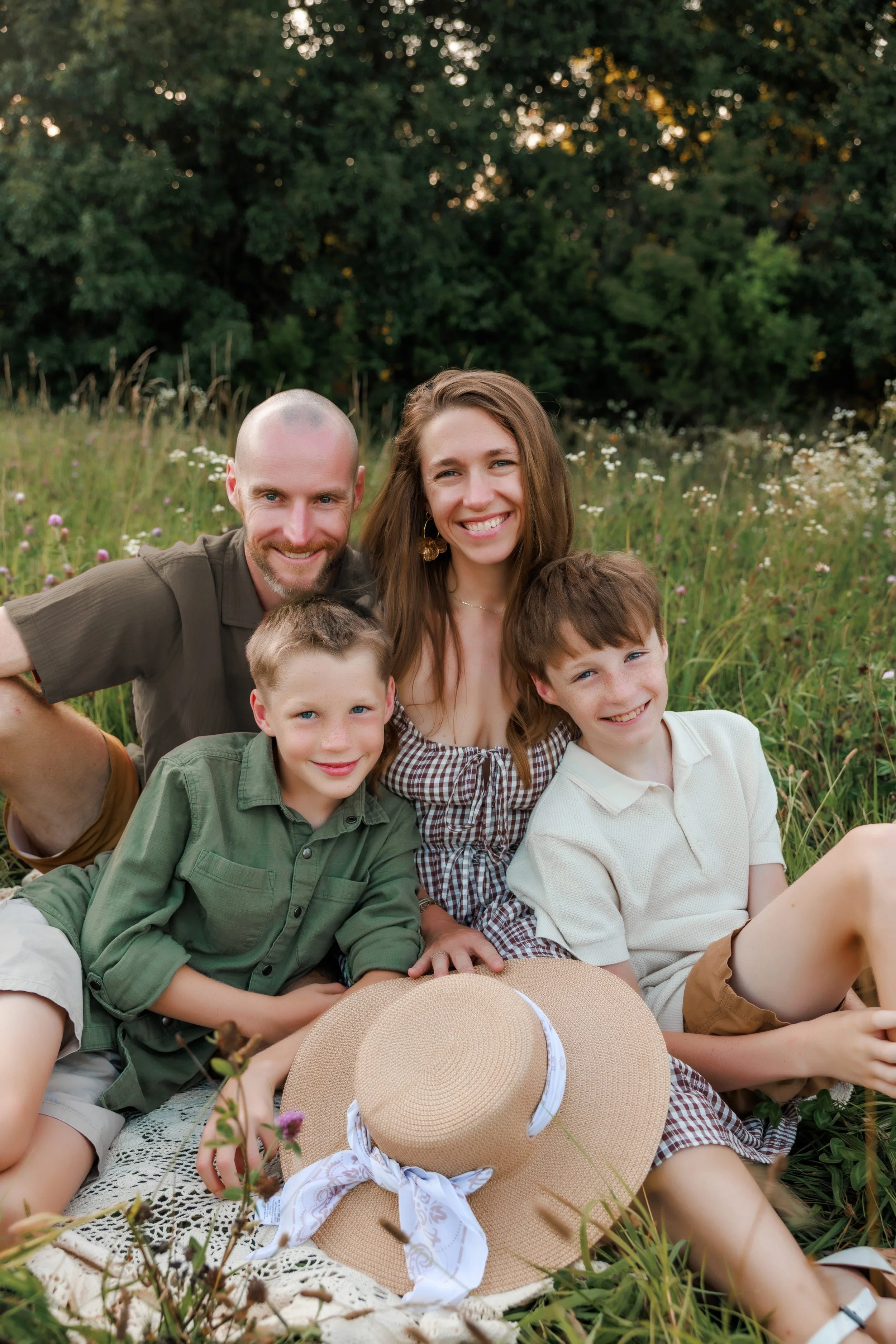   "Kansas City family photographer - family in neutral outfits at outdoor session"  