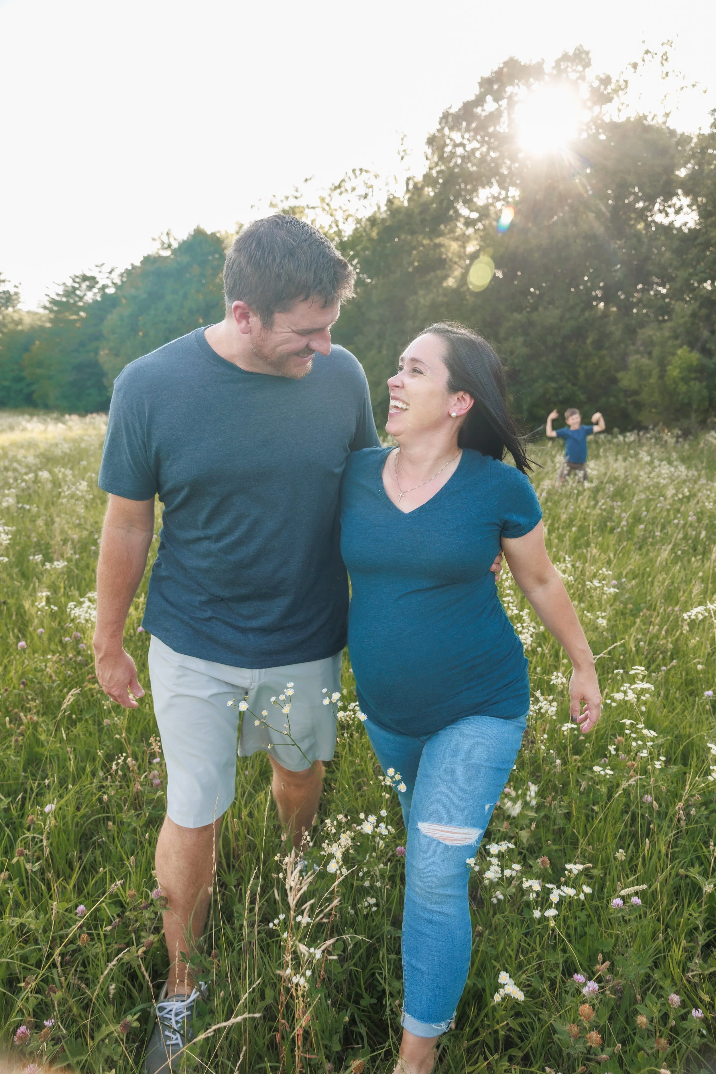   casual family maternity photo outdoors in natural light  