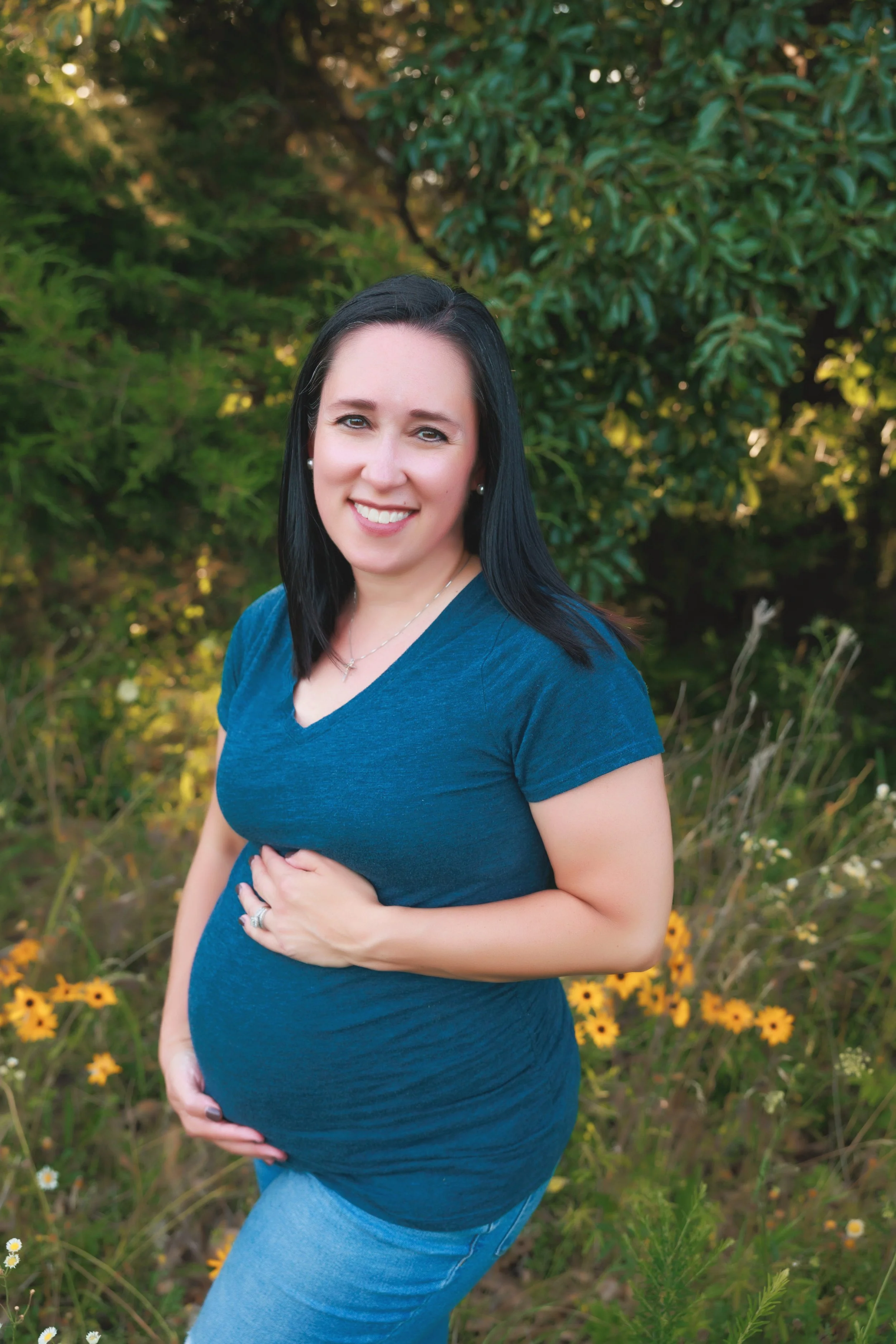   casual family maternity photo outdoors in natural light  