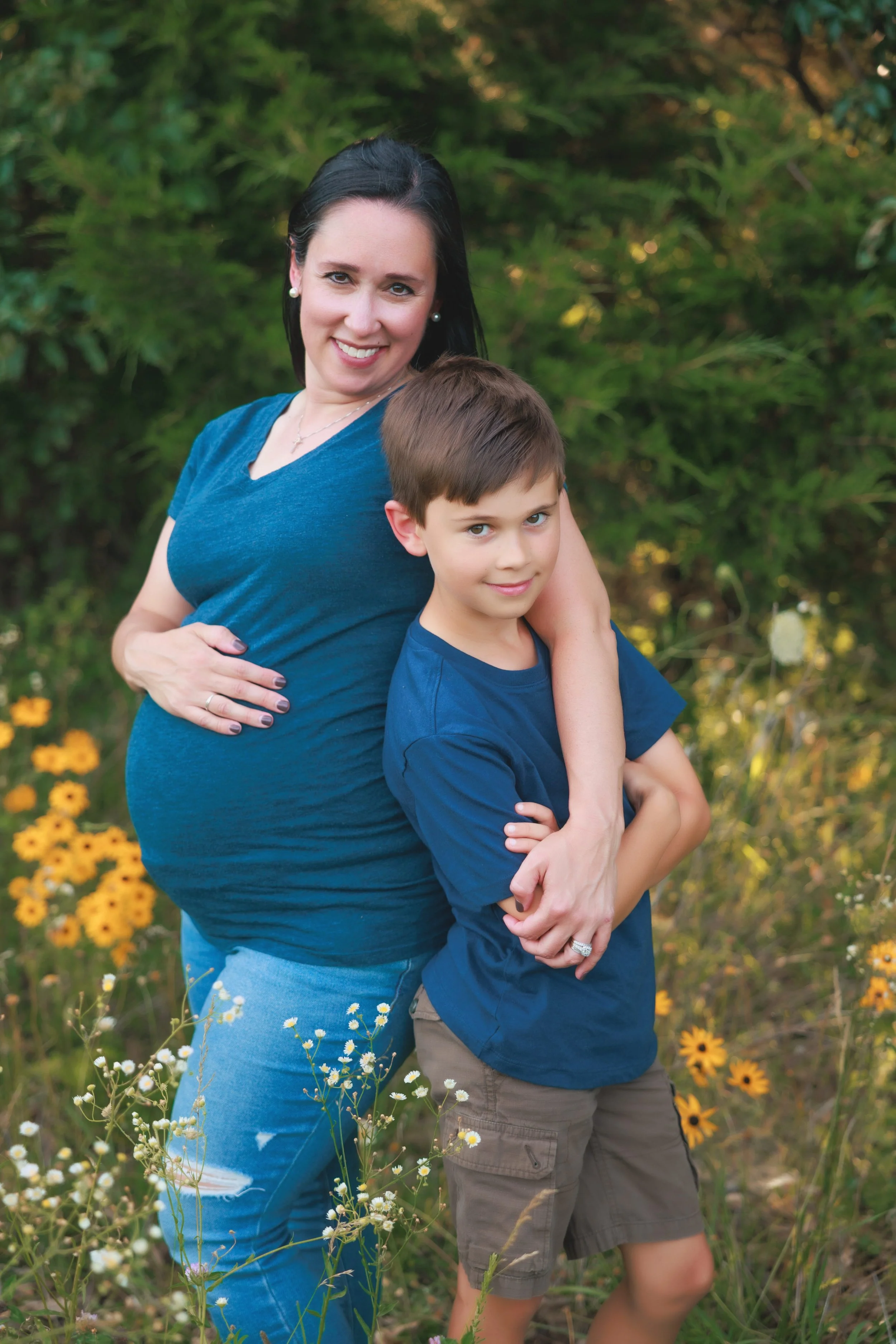   casual family maternity photo outdoors in natural light  