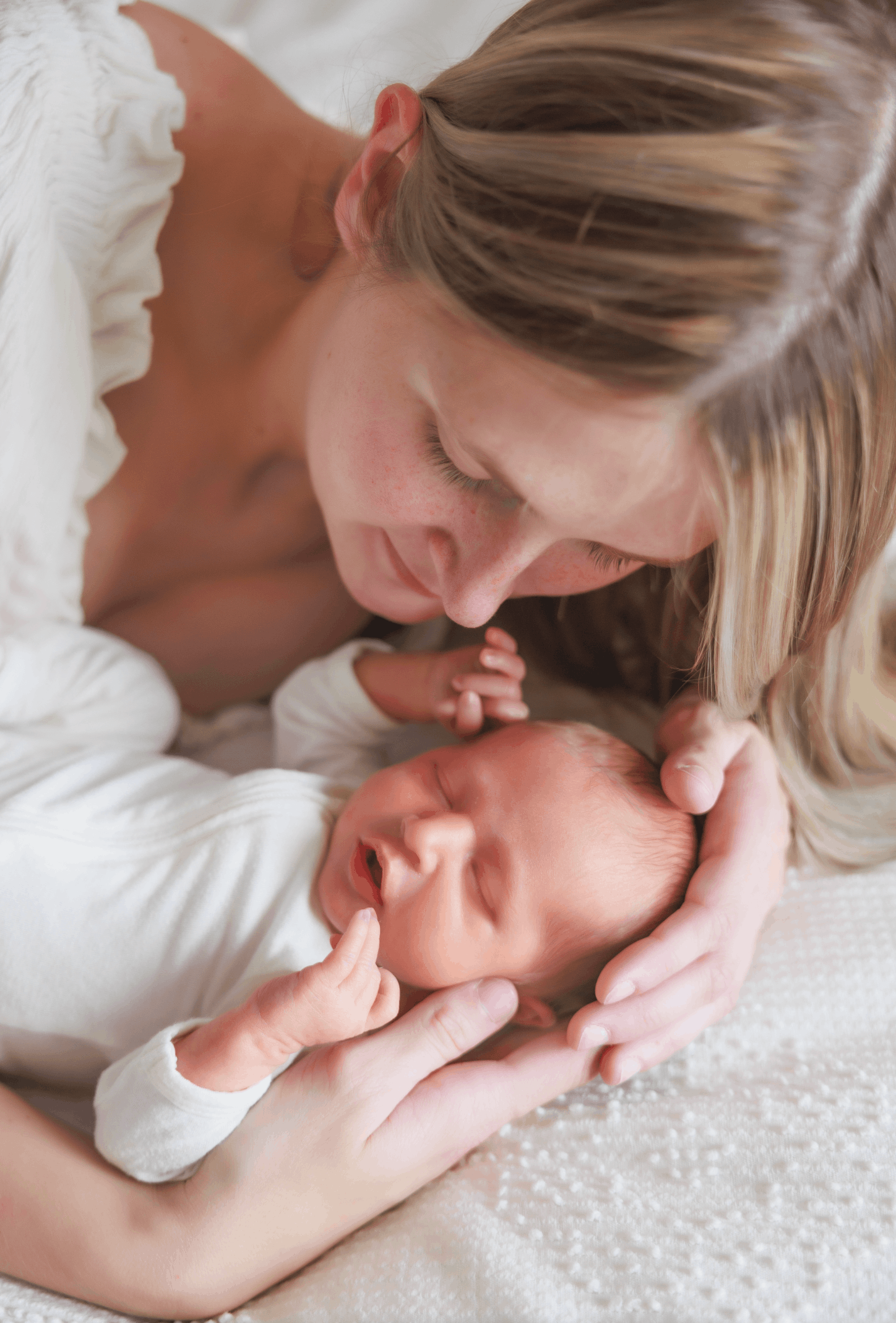 mom and newborn photo session