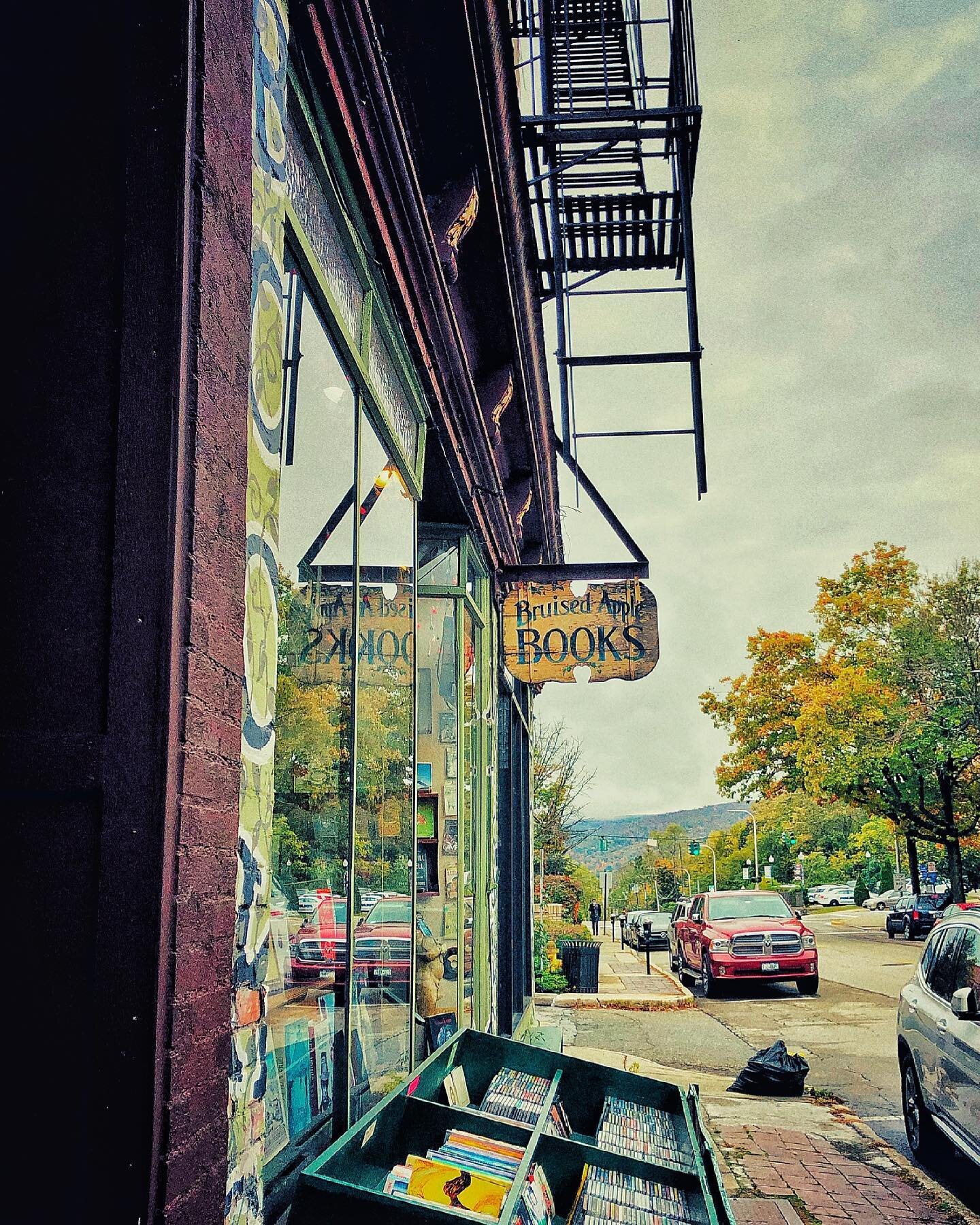 She had run until her lungs burned. Scraping the skin of her shoulder against the brick wall, she spotted the sign for a bookstore she had never seen before. It must be new, she thought. She looked behind her to see them stretching their necks and sp