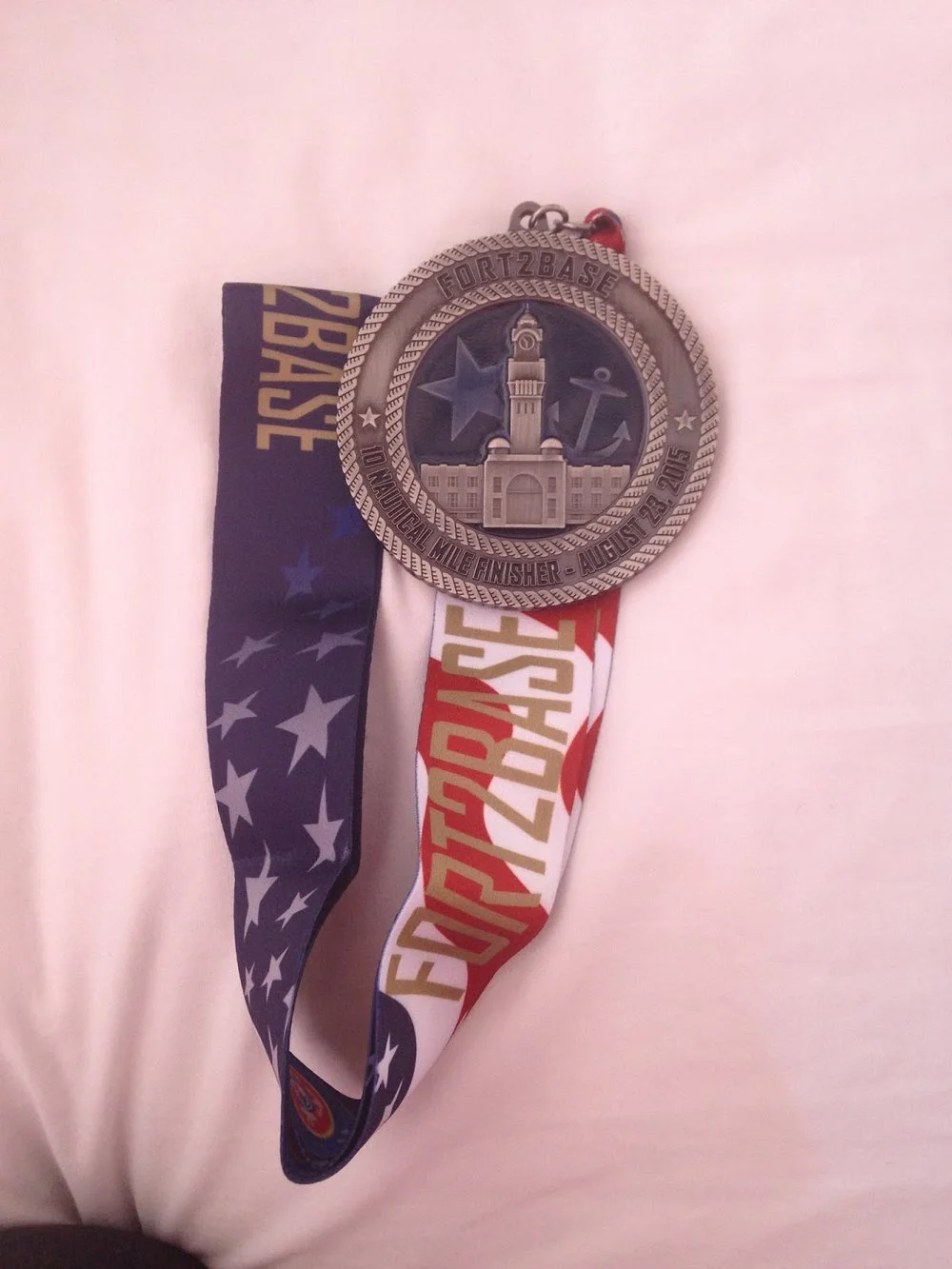11.5 Miles, 1 rain storm, and an awesome medal!