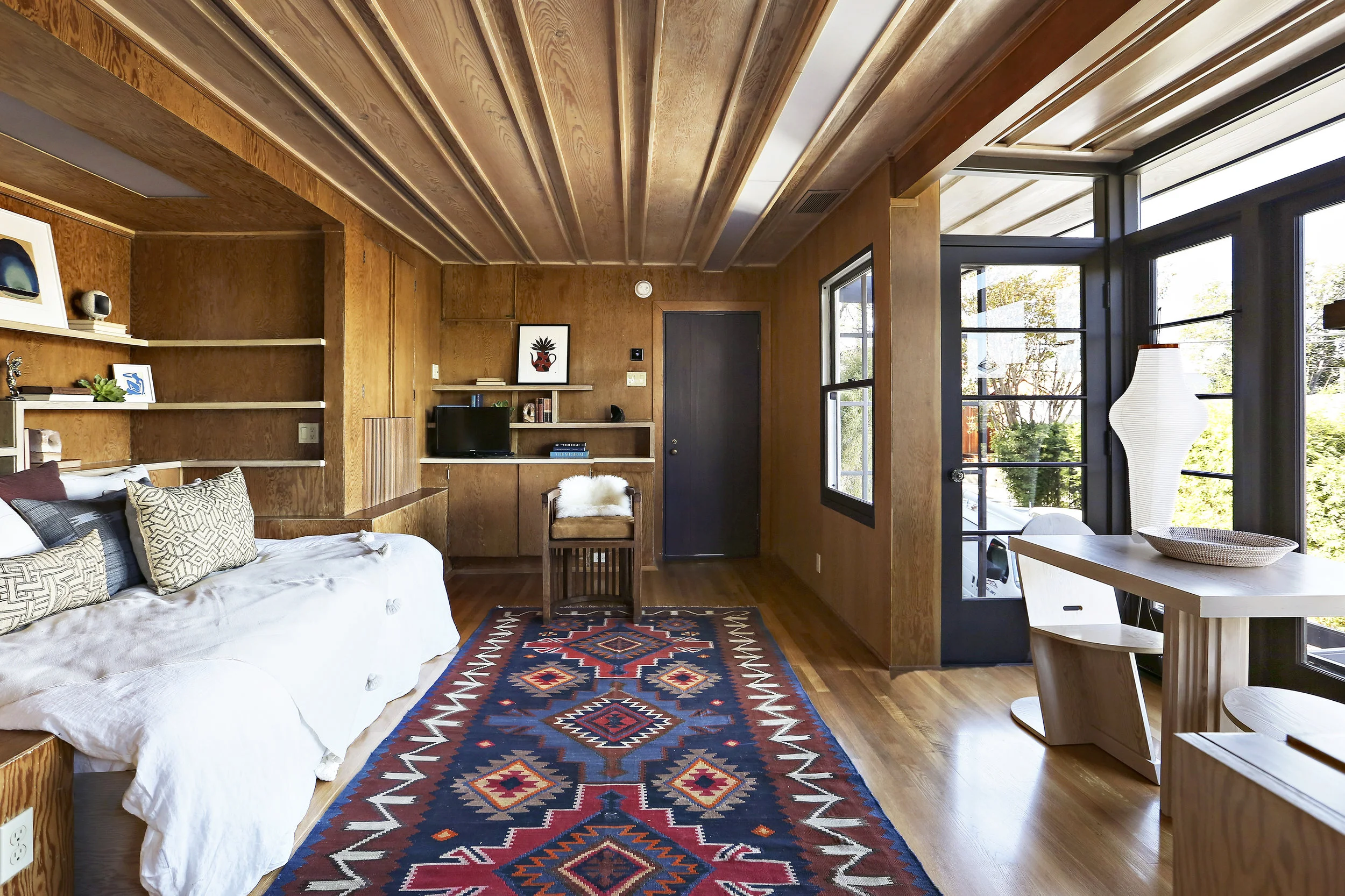 The living and dining spaces in a studio apartment at Manola Court.