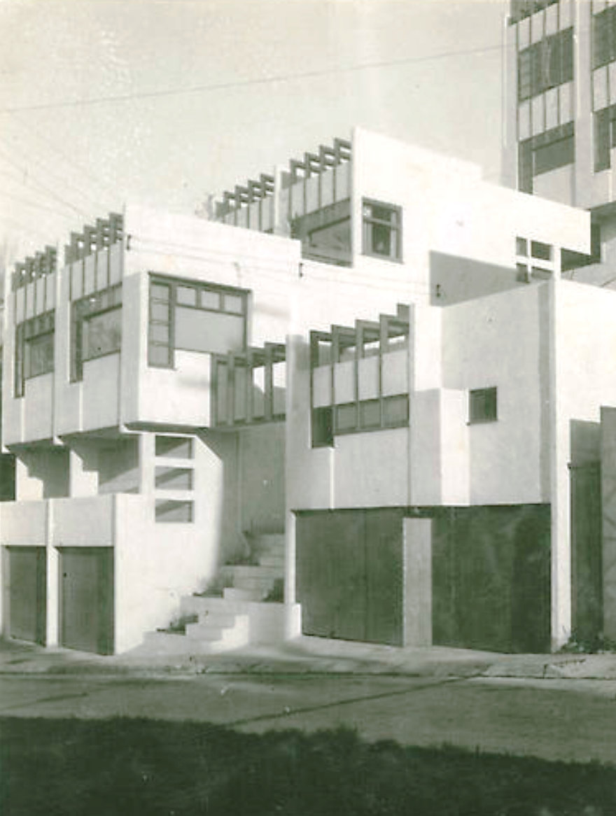 Three of the Manola Court apartment units and the corresponding garages. Photo published in American Home in 1942.