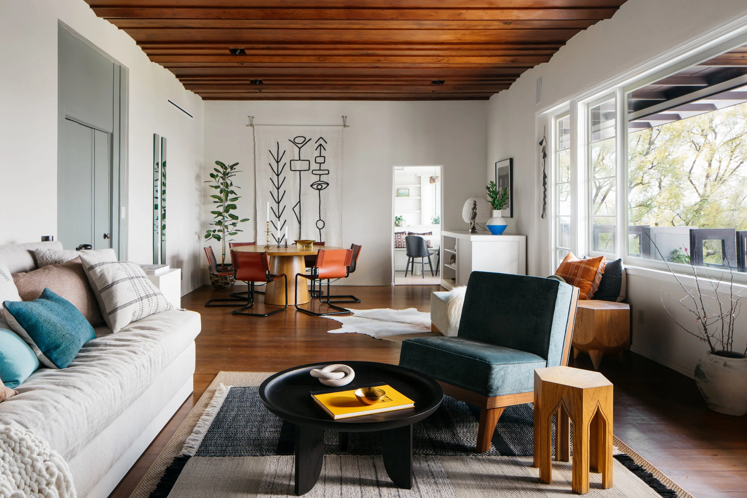 The living and dining room in the Penthouse at Manola Court.