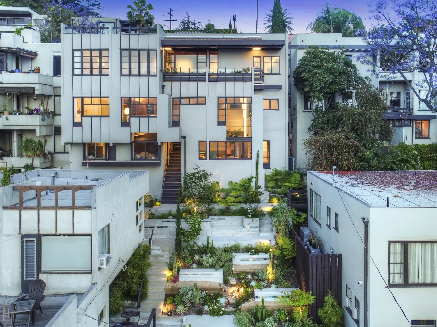 Overview of the Penthouse, Music Room, Maid's Room, and central courtyard at Manola Court.