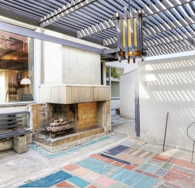 This Schindler designed patio, located outside a two bedroom apartment, is one place where Herman Sachs put his genius of mural design to work on the property. Fashioned out of tiles, the ground displays the rich blue, turquoise, rust, and peachy-pin