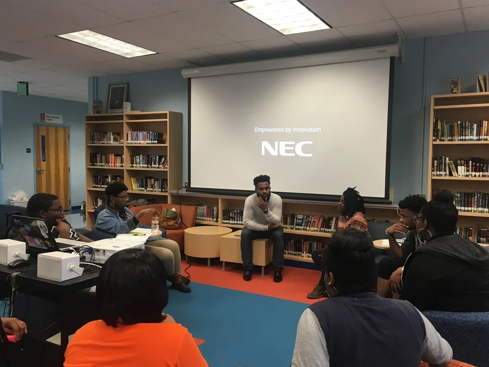 Students meeting with Director Amberly Ellis and Jeremy Mines about the documentary being filmed about the students’ journey to Cuba.