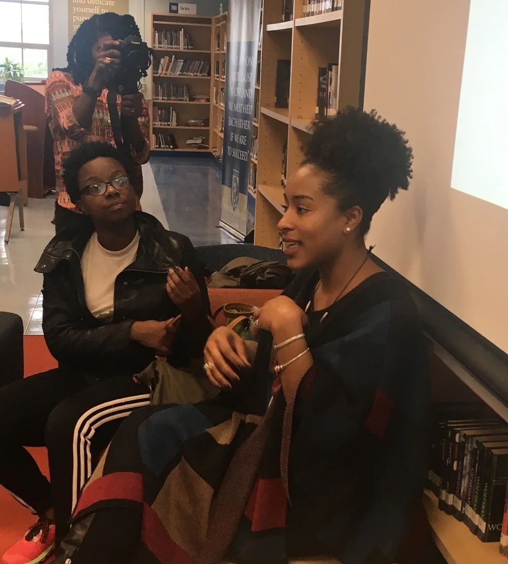 Co-Founder Jasmine Hall sharing with students. Pictured with guest speaker, Nia Hampton and Amberly Ellis, filming.