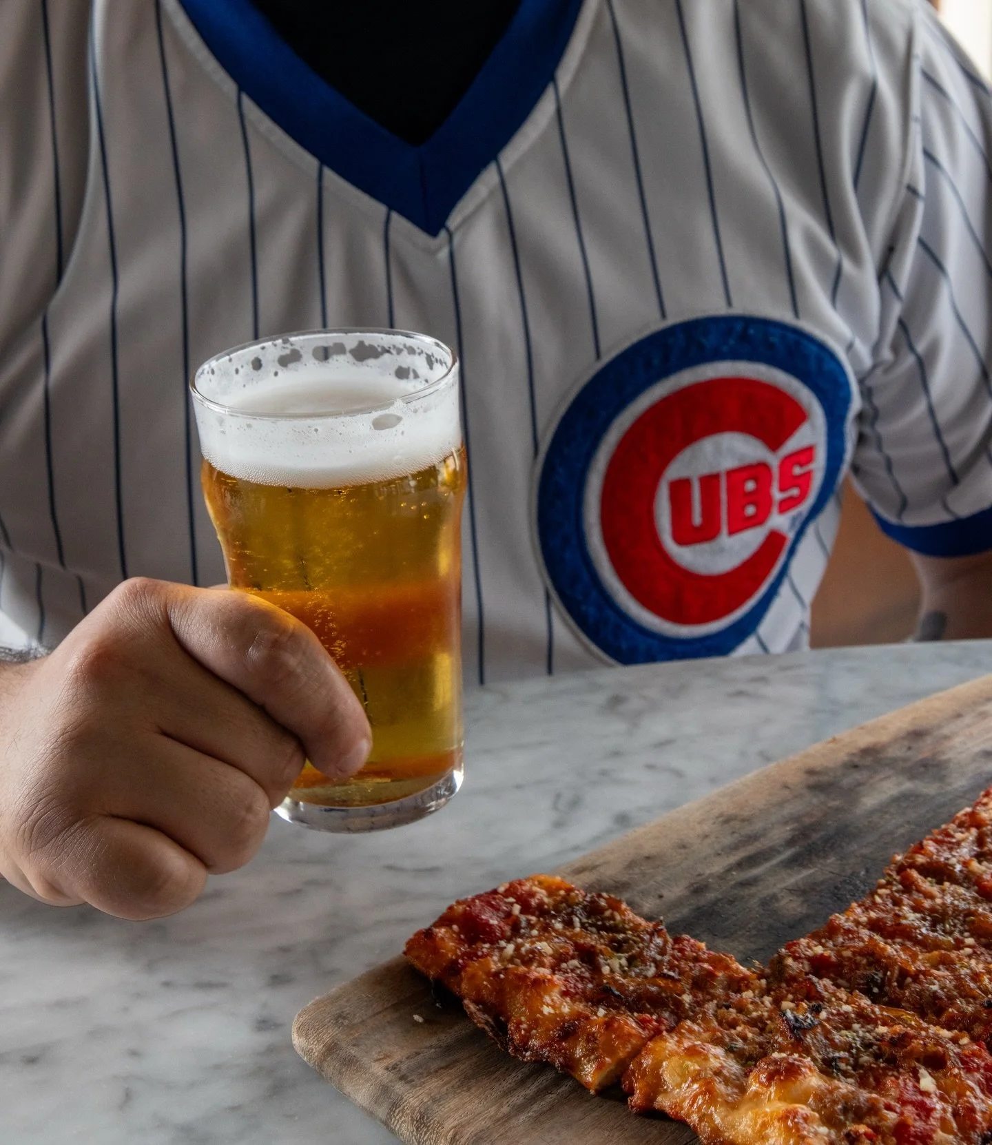Opening Day at Wrigley? We&rsquo;re just a short stroll away. Keep the celebration going with pizza and a post-game beer. 🍕🍺⚾
