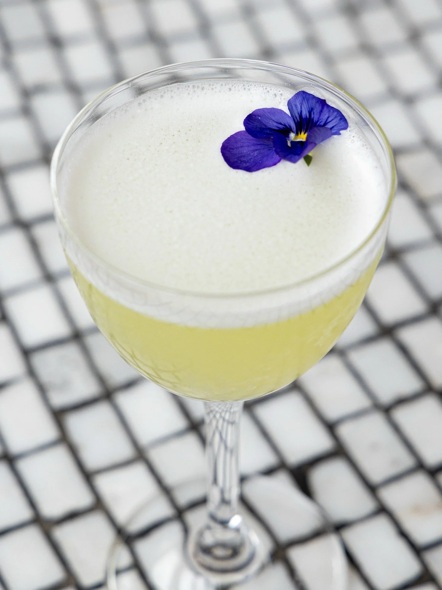 New cocktails are in bloom 🌿 Witches Brew &bull; vodka, strega, cucumber, basil, lime