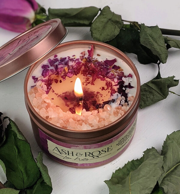 Love Notes Loaded Tin Candles-  8 oz. Dreamy soy candle packed with crushed rose petals and Himalayan pink salt crystals that sparkle and swim in the warm, lightly scented wax&nbsp; The love notes scent features hints of rose, peony, bergamot, vanil…