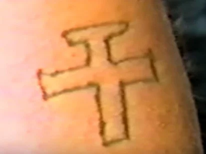 Note to aspiring tattoo artists: Use a ruler.