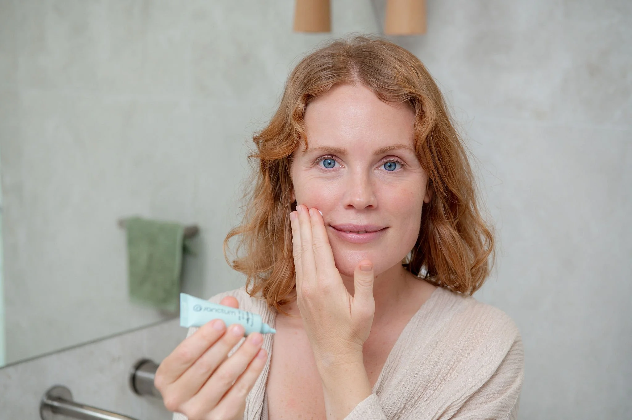 Mum and toddler playing together during a lifestyle skincare photoshoot at home