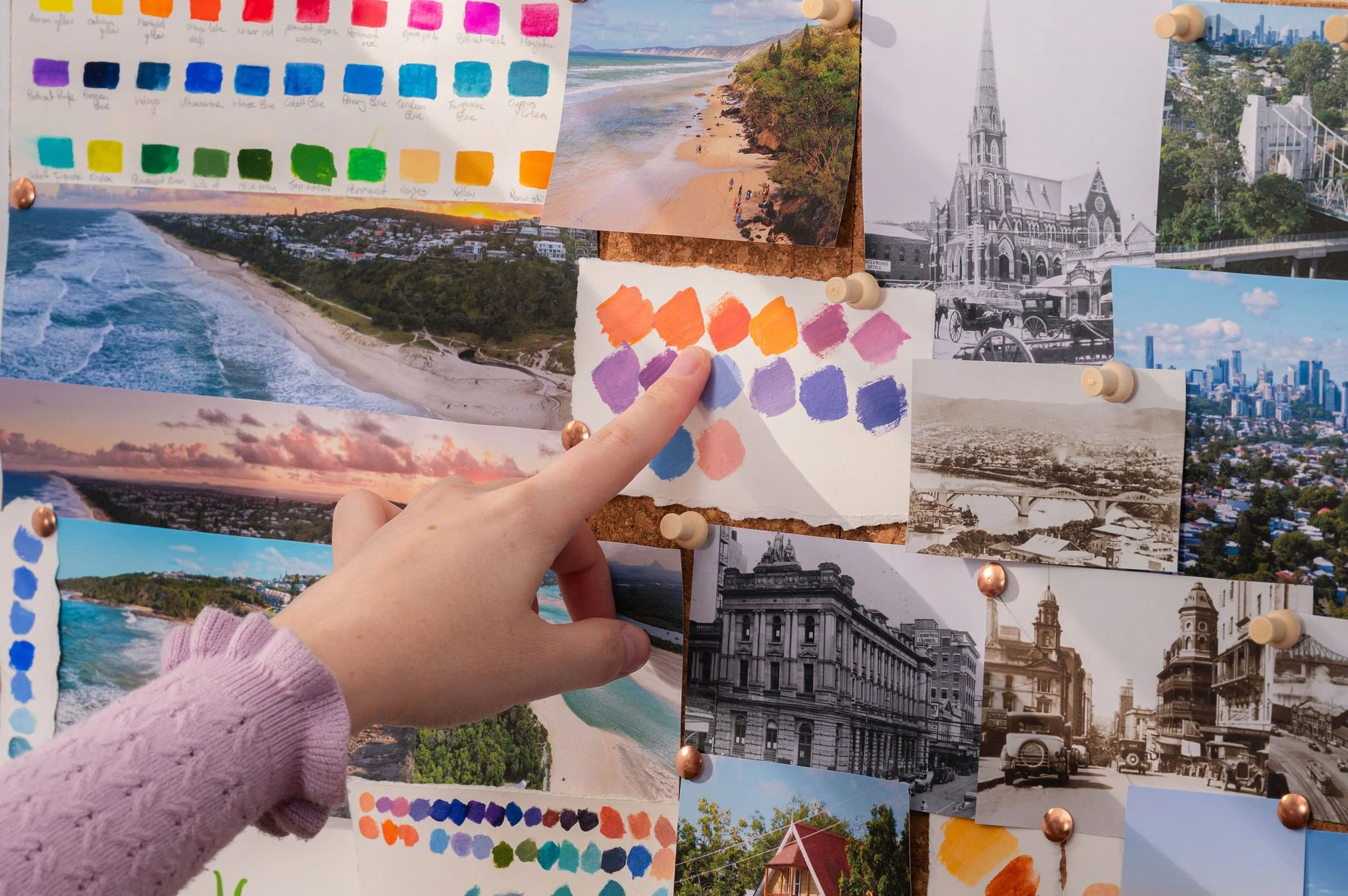 Brisbane artist Eliza painting in her studio