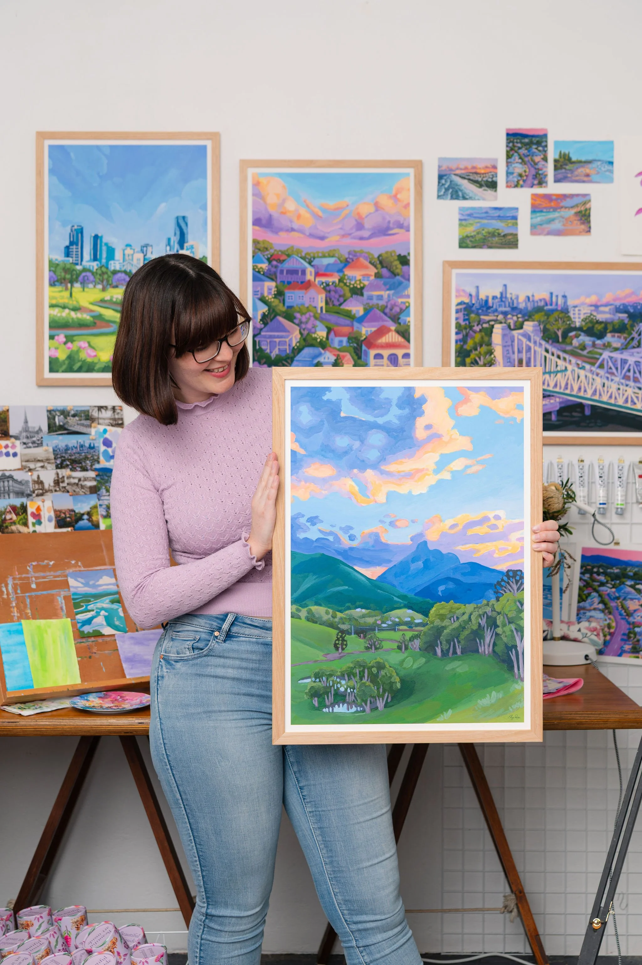 Brisbane artist Eliza painting in her studio