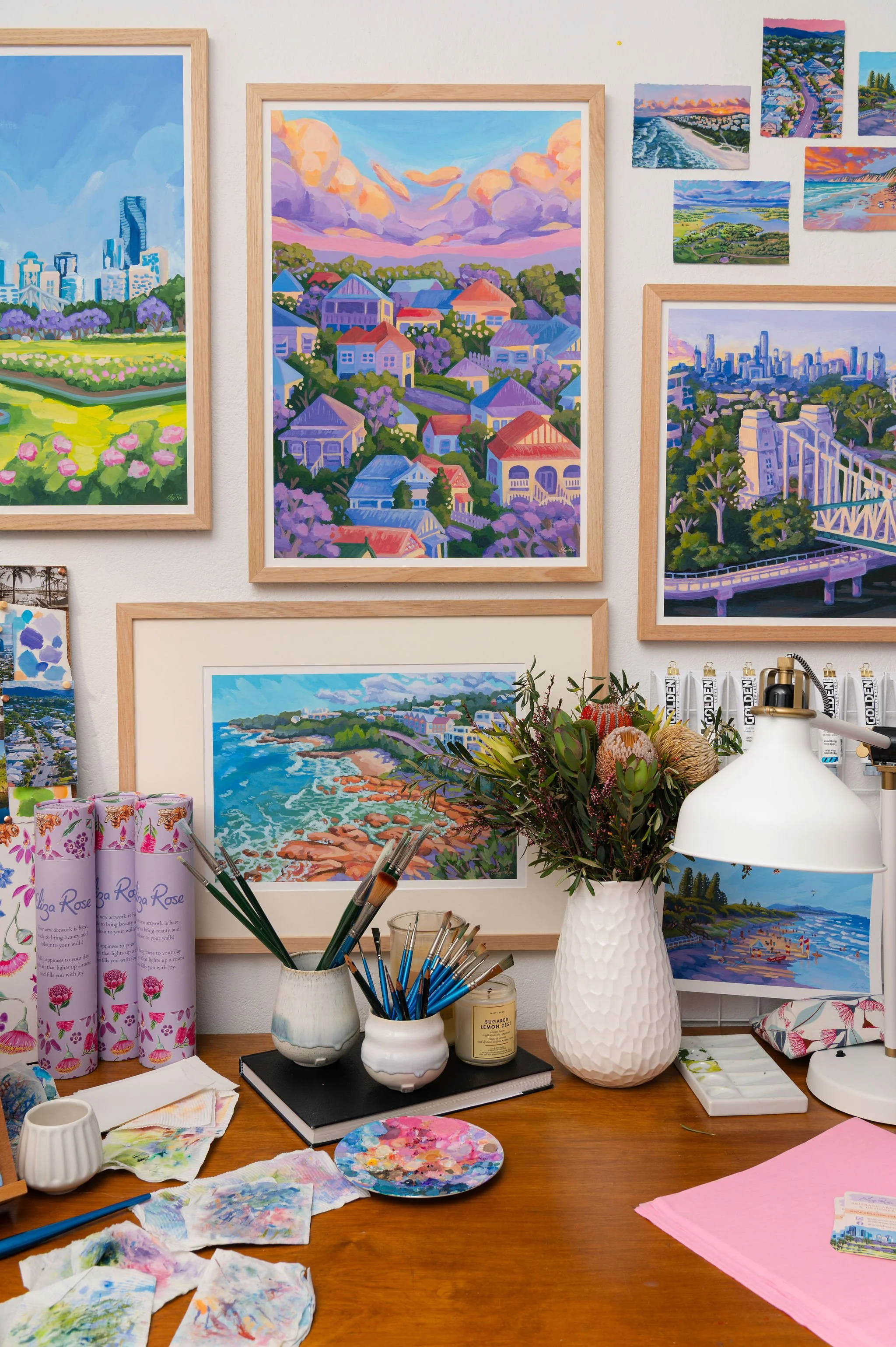 Brisbane artist Eliza painting in her studio